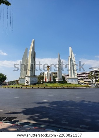 Democracy monument in Bangkok, Thailand with blue sky and sunshine day