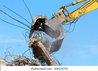 Demolition Crane Dismantling A Building