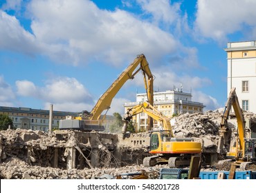 Demolition On Building Site With Excavator