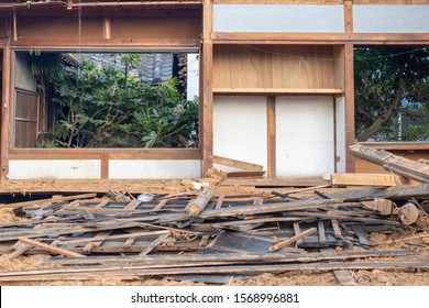 Demolition work of an old Japanese wooden house - Shutterstock ID 1568996881