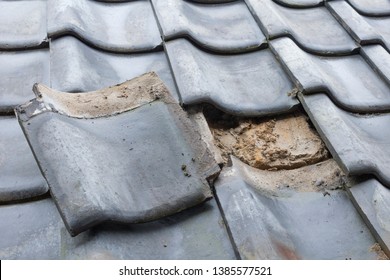 Demolition work of roof tiles in Japan - Shutterstock ID 1385577521