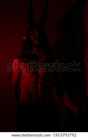 Demon in red. Devil cosplay. 