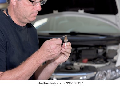 Demonstrating How To Gap A Spark Plug