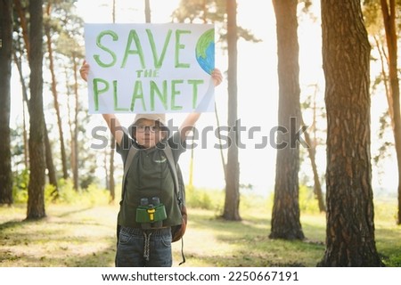 demonstration against global warming and pollution. Child boy making protest about climate change, plastic problems, global warming, pollution. Save the planet poster. Climate Strike. Eco Activism