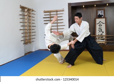 Demonstration of fighting art Aikido. In  sports hall (dodjo)