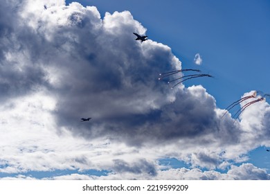 Demonstration Of Interception Of Pilatus PC-24 T-786 Airplane By Two FA 18 Hornet Fighter Jets Of The Swiss Air Force At Axalp Air Display 2022. Photo Taken October 18th, 2022, Axalp, Switzerland.