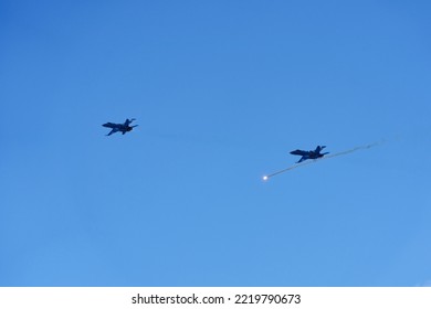 Demonstration Of Interception Of Pilatus PC-24 T-786 Airplane By Two FA 18 Hornet Fighter Jets Of The Swiss Air Force At Axalp Air Display 2022. Photo Taken October 18th, 2022, Axalp, Switzerland.