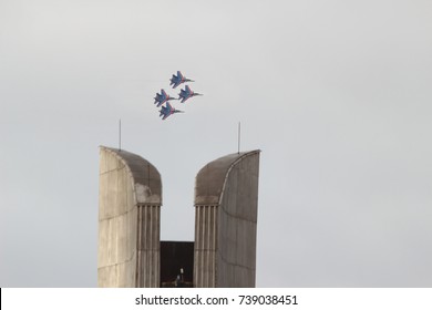 Demonstrative performance of an aviation group in the sky of the city of Izhevsk 21.10.2017. Over maneuverable fighters of Soviet manufacture. Military equipment for peaceful purposes