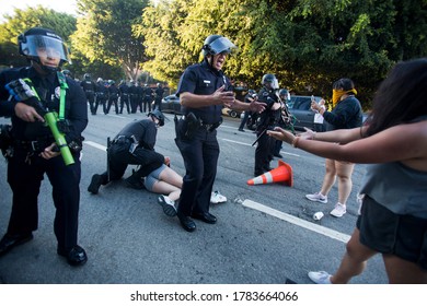 A demonstrator is arrested by police during a protest in support of the two-month long police protest movement in Portland, Oregon, Saturday, July 25, 2020 in Los Angeles.