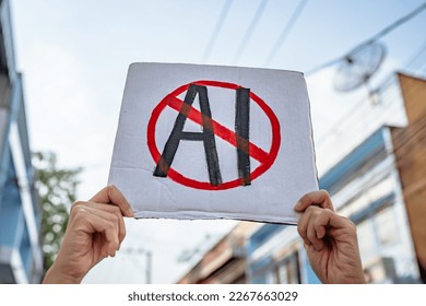 Demonstrator holding "No AI" placard - Shutterstock ID 2267663029