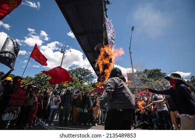 Demonstrators Block A Main Road And Set Fire To A Mannequin In Protest Against Police Abuse In The City Of Medellín (Colombina). July 20 Of 2021