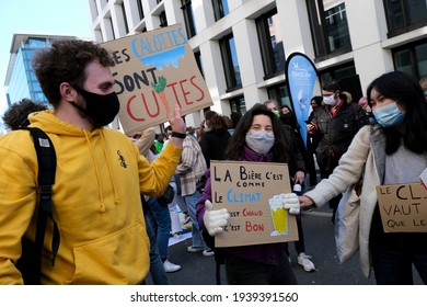 Demonstrators holds signs during a demonstration a "Fridays for future"  organised by Youth for Climate Belgium in Brussels, Belgium on March 19, 2021.