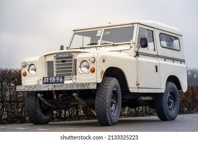 DEN HAAG, NETHERLANDS - Jan 14, 2022: A Low Angle Shot Of An Old White Land-rover Car