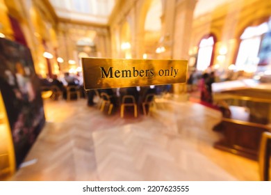 Den Haag, Netherlands - June 15 2022: An Elegant Members Only Club Has A Gold Plated Sign At The Glass Entrance Door