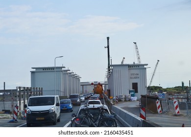 Den Oever, Netherlands - August 2121: Traffic Delay On Road Due To Construction Work On Afsluitdijk, The Dike Between North Holland And Friesland