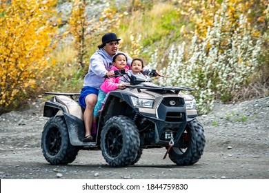 Denali, AK / USA / 9/5/2020: Alaskan Native Citizens Riding ATVs Weekend Family Fun