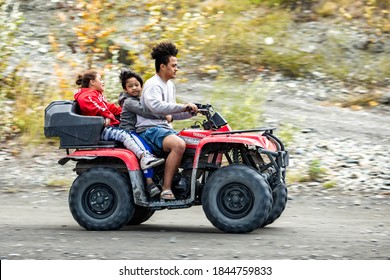 Denali, AK / USA / 9/5/2020: Alaskan Native Citizens Riding ATVs Weekend Family Fun