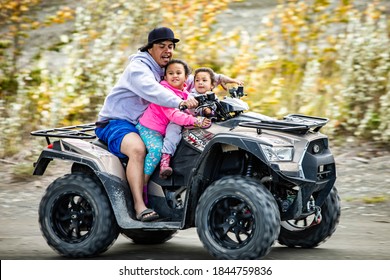 Denali, AK / USA / 9/5/2020: Alaskan Native Citizens Riding ATVs Weekend Family Fun