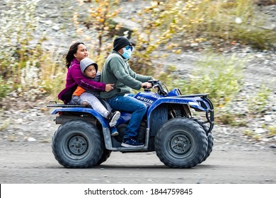 Denali, AK / USA / 9/5/2020: Alaskan Native Citizens Riding ATVs Weekend Family Fun