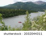 Denali, Alaska, United States - August 1 2017: Wild river rafting is popular adrenaline tourist activity in Alaska near Denali National Park
