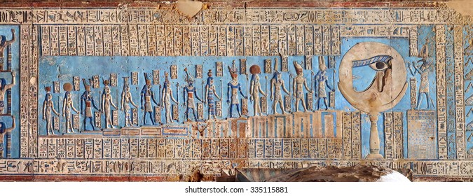 DENDERA, EGYPT - DECEMBER 05, 2014: Hieroglyphic Carvings And Paintings On The Interior Walls Of An Ancient Egyptian Temple In Dendera