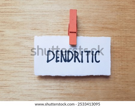 Dendritic writting on table background.