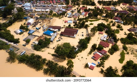 DENGKIL, MALAYSIA - DEC 20, 2021: Areal view of Dengkil district from flooding that causes damage of the infrastructure and housing area. Selective focus, contains dust and grain