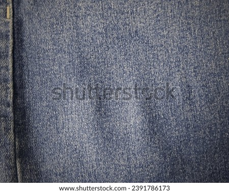 Denim background with the stitching 