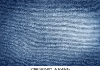Denim background texture for design. Canvas denim. Denim blue jeans fabric. 