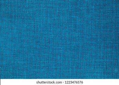 Denim Blue Color Linen Cloth Background. Pure Linen Blue Fabric Texture. Blue Canvas Background