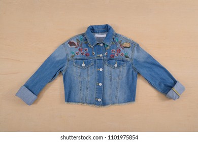 Denim Embroidered Flowers Jacket Jeans –wooden Background
