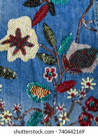 Denim Embroidered Flowers Jeans Texture.