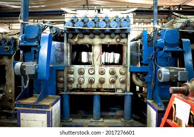 Denim Fabric Rolls Through Chemical Tanks For Finishing Treatment In Denim Manufacturing Unit.

