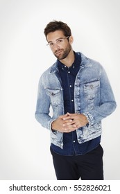 Denim jacket man looking at camera