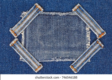 Denim Patch And Jean Straps With Orange Double Thread Seams On Denim Fashion Background.