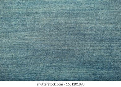 Denim Texure. Closeup. Light Blue-green Color. Horizontal Picture.