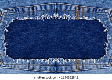 Denim Torn Frame Texture Background. Ripped Denim Fabric, Text Place, Copy Space. Washed Denim Cloth With Fringe Edge. Fashion Backdrop.