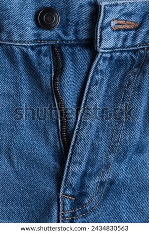 Denim trousers with an unbuttoned fly in closeup Foto d'archivio © 