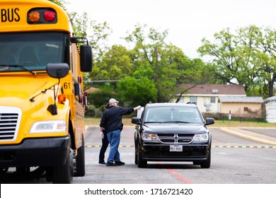 Denison, TX / United States - April 1 2020: The Denison ISD Food Service Staff Hands Out Lunches On April 2, 2020 At Scott Middle School.