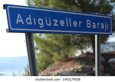 Denizli,Turkey-07/12/2019: Adıgüzel Dam Is An Embankment Dam On The Büyük Menderes River, Which Called Hidden Heaven Because Of The Nature It Created. This Is The Sign Of The Dam. 