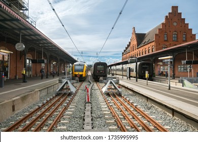 Helsingør / Denmark - 09.22.2016: Helsingør Station Track Area, Railways With Black And  Yellow Electric Trains.