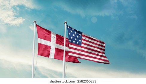 Denmark and America friendship flags are waving in the sky.Two country flag for agreement or deal. Denmark USA national flag for comittment.