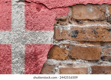 Denmark. Danish flag on stone wall. Copy space. Constitution day and Independence Day.