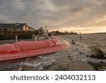 Denmark, Dec. 22. Watertubes protect against flooding in Frederikssund when the water level is at its highest on Friday afternoon, (Credit Image: © Stig Alenäs)