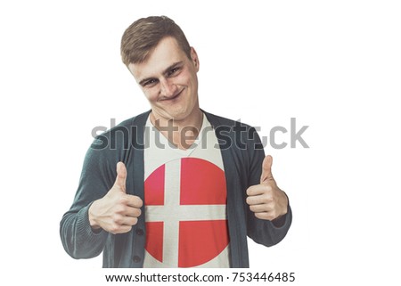 Denmark flag on shirt of the funny man showing gesture like a hand on an isolated background.