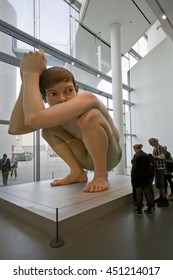 Denmark - October 18, 2014: Hyper-realistic Sculptures Ron Mueck - Boy. ARoS Aarhus Kunstmuseum, Arhus.