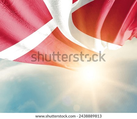 Denmark waving flag in beautiful sunlight.