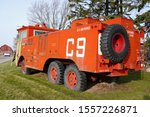 Denmark, Wisconsin / USA - November 9th, 2019: Vintage old US Air Force Airport Crash Rescue Fire Truck sits in front of Antique Shop.