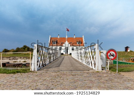 Denmarks oldest swing bridge crossing Frederik VII's canal and Limfjord museum building at Løgstør, Denmark