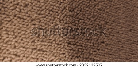 Dense brown wool loop pile texture background for mobile app screen
